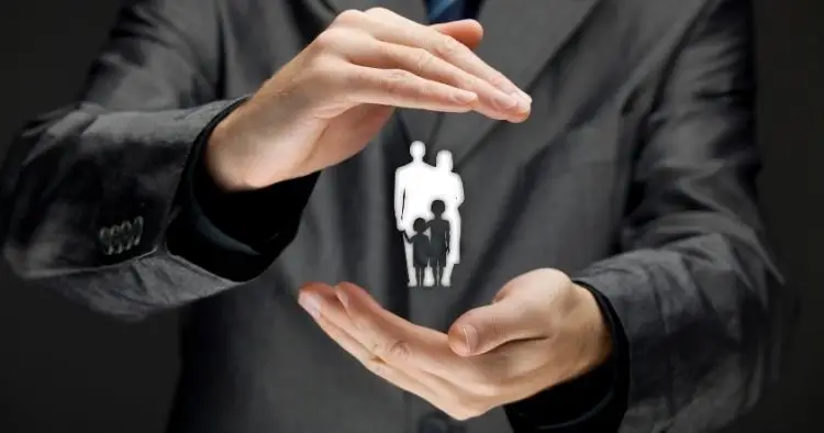 A life insurance agent talking to a family about the importance of life insurance